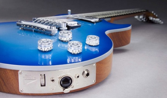 Con Lennonun və Corc Harrisonun gitarası 408 min dollara satılıb