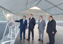 Prezident İlham Əliyev Taxtakörpü-Ceyranbatan kanalından suyun yeni suvarılan torpaqlara verilməsi üçün suburaxıcı qurğunun təməlinin qoyulmasında iştirak edib  (FOTO)