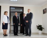 İlham Əliyev Əmircan qəsəbəsindəki 84, Binəqədi rayonundakı 182 nömrəli məktəblərin yeni binasının açılışında iştirak edib (FOTO)