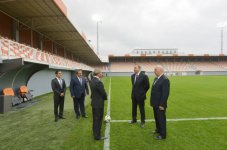 İlham Əliyev Masazır qəsəbəsində inşa olunan stadionun açılışında iştirak edib (FOTO)