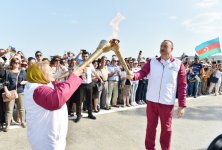 Prezident İlham Əliyev Dənizkənarı Milli Parkdakı “Sadko” limanında Avropa Oyunlarının məşəlini qəbul etdi (FOTO)