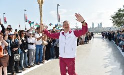 Prezident İlham Əliyev Dənizkənarı Milli Parkdakı “Sadko” limanında Avropa Oyunlarının məşəlini qəbul etdi (FOTO)