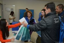 Müxtəlif ölkələrin nümayəndə heyətləri Bakıda idman gimnastikası üzrə Dünya Kuboku üçün akkreditasiyadan keçirlər (FOTO)