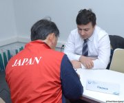 Müxtəlif ölkələrin nümayəndə heyətləri Bakıda batut gimnastikası üzrə Dünya Kuboku üçün akkreditasiyadan keçirlər (FOTOREPORTAJ)
