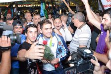 Azərbaycan olimpiyaçıları Vətənə döndülər (FOTO)