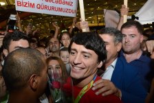 Azərbaycan olimpiyaçıları Vətənə döndülər (FOTO)