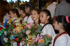 Azərbaycan olimpiyaçıları Vətənə döndülər (FOTO)