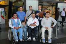 Paralimpiyaçılarımız Vətənə döndülər (FOTO)