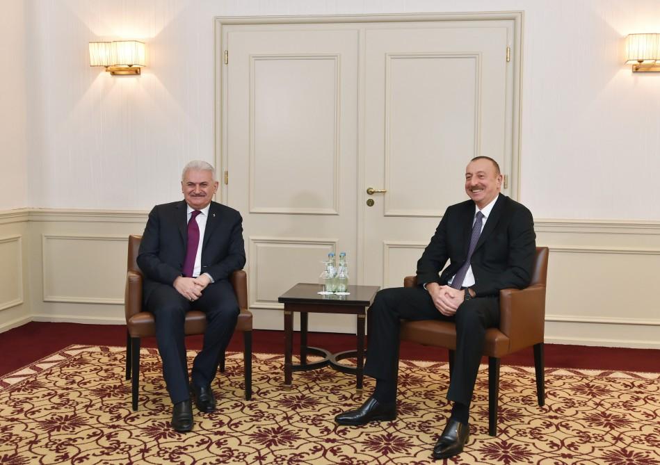 Prezident İlham Əliyevin Münhendə Türkiyənin Baş naziri ilə görüşü olub (YENİLƏNİB)  (FOTO)