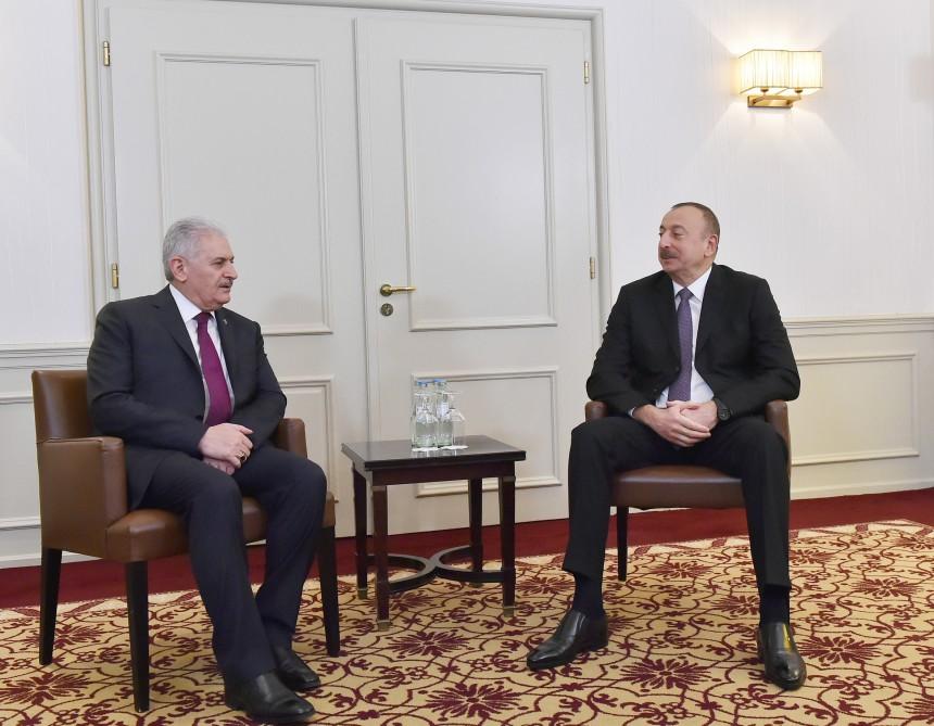 Prezident İlham Əliyevin Münhendə Türkiyənin Baş naziri ilə görüşü olub (YENİLƏNİB)  (FOTO)