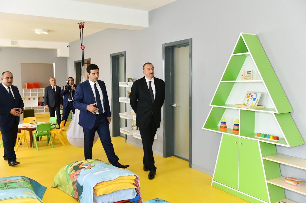 Prezident İlham Əliyev Heydər Əliyev Fondunun təşəbbüsü ilə Qaxda inşa olunmuş 180 yerlik körpələr evi-uşaq bağçasının açılışında iştirak edib (FOTO)