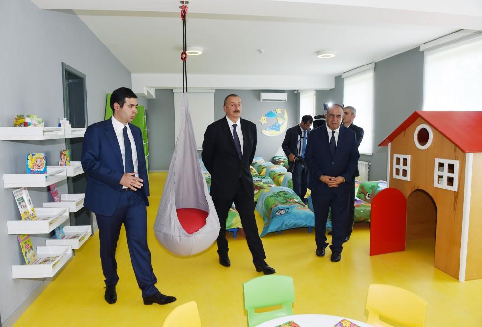 Prezident İlham Əliyev Heydər Əliyev Fondunun təşəbbüsü ilə Qaxda inşa olunmuş 180 yerlik körpələr evi-uşaq bağçasının açılışında iştirak edib (FOTO)