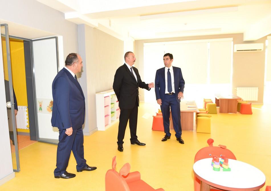 Prezident İlham Əliyev Heydər Əliyev Fondunun təşəbbüsü ilə Qaxda inşa olunmuş 180 yerlik körpələr evi-uşaq bağçasının açılışında iştirak edib (FOTO)