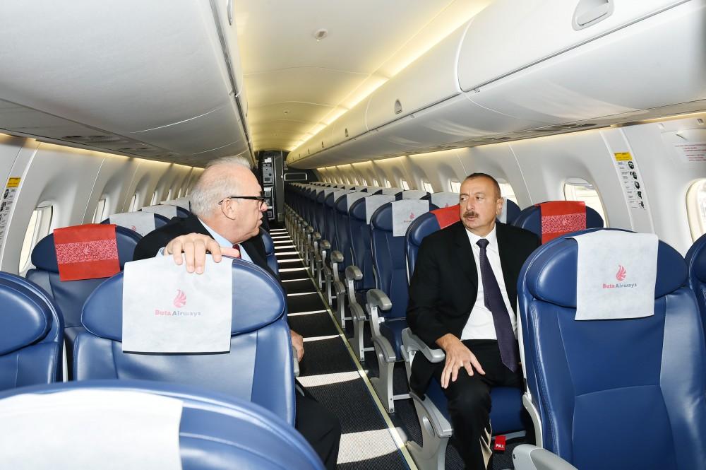 Prezident İlham Əliyev "Buta Airways" aviaşirkətinin Bakıya gətirilən ilk "Embraer 190" təyyarəsi ilə tanış olub (FOTO)