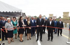 Prezident İlham Əliyev Salyan rayonunun Çuxanlı-Gəncəli-Piratman-Parça Xələc-Seyidan avtomobil yolunun açılışında iştirak edib (YENİLƏNİB) (FOTO)