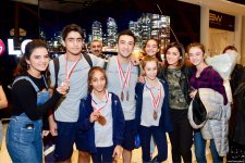 Avropa Çempionatının medalçı akrobatları Bakıya dönüb (FOTO)