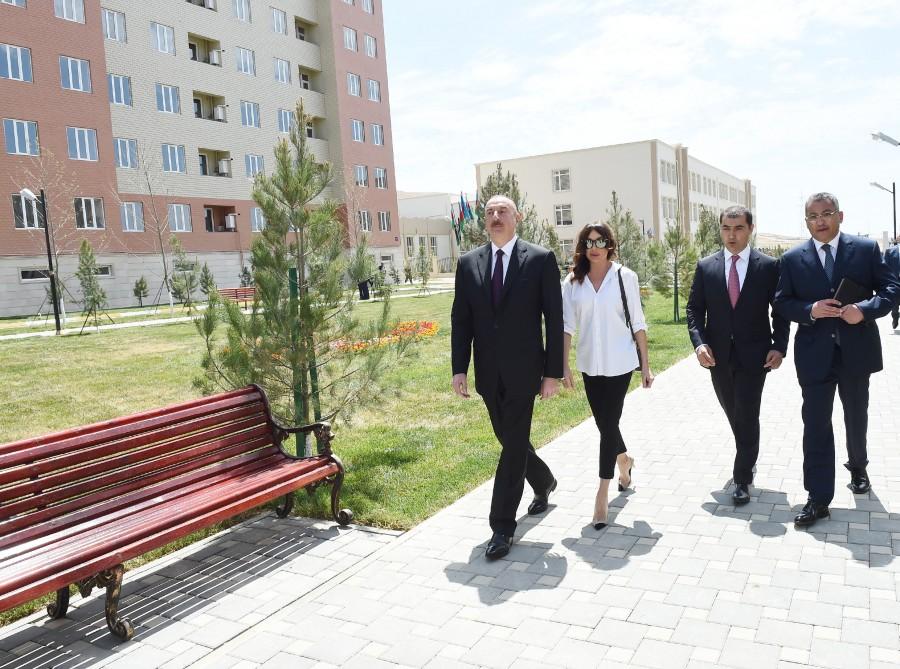 Prezident İlham Əliyev və birinci xanım Mehriban Əliyeva məcburi köçkünlər üçün salınmış “Qobu Park” yaşayış kompleksinin açılışında iştirak ediblər (YENİLƏNİB-2) (FOTO)