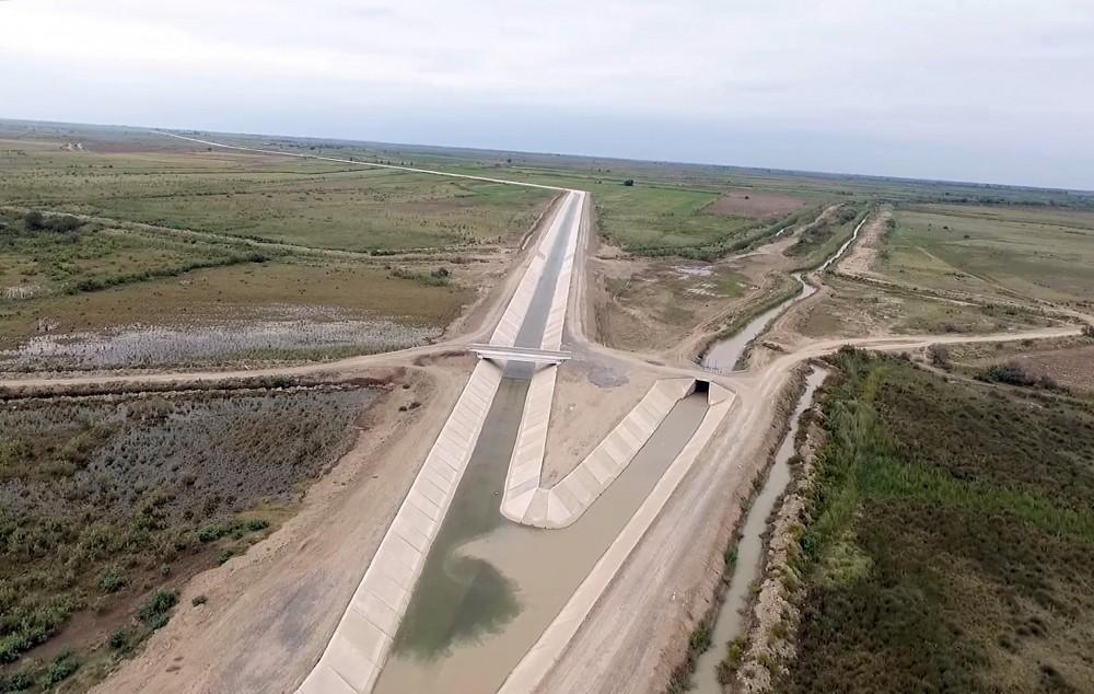 Prezident İlham Əliyev İmişli rayonunda Araz çayının yeni qol-kanalının açılış mərasimində iştirak edib (FOTO) (YENİLƏNİB)