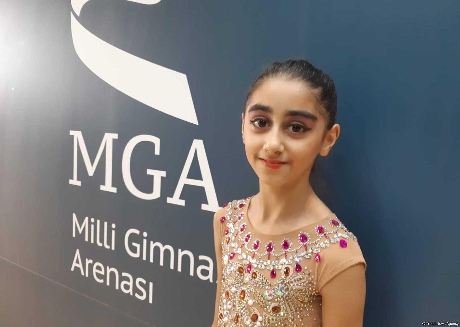 Gənc gimnast: Milli Gimnastika Arenasında çıxış etmək hər zaman rahatdır