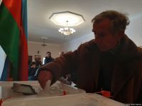 Azərbaycan xalqı parlament seçkilərində səs verir (FOTOREPORTAJ)