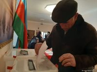 Azərbaycan xalqı parlament seçkilərində səs verir (FOTOREPORTAJ)