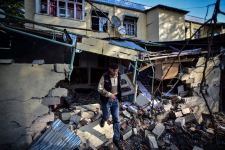 Dünyanın susqunluğu qarşısında danışan şəkillər  (FOTO)