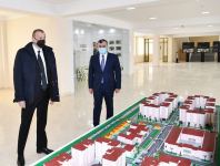 Prezident İlham Əliyev Ramanada şəhid ailələri və müharibə əlillərinə mənzillərin təqdim olunması mərasimində iştirak edib (FOTO) (YENİLƏNİB)