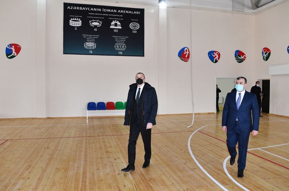 Prezident İlham Əliyev Ramanada şəhid ailələri və müharibə əlillərinə mənzillərin təqdim olunması mərasimində iştirak edib (FOTO) (YENİLƏNİB)