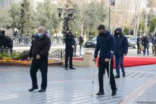 Vətəndaşlar "Ana harayı" abidəsini ziyarət edirlər (FOTOREPORTAJ)
