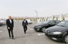 Prezident İlham Əliyev Hacıqabul Sənaye Məhəlləsinin açılışında iştirak edib (FOTO) (YENİLƏNİB)