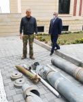 Prezident İlham Əliyev Ermənistan tərəfindən Tərtərə atılmış mərmilərə baxıb (FOTO)