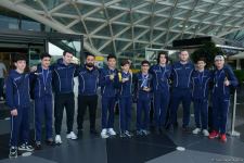 Avropa Çempionatında medallar qazanmış gimnastlar Azərbaycana qayıdıb (FOTO)