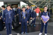 Avropa Çempionatında medallar qazanmış gimnastlar Azərbaycana qayıdıb (FOTO)