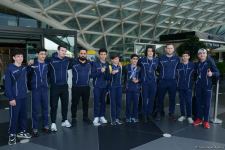 Avropa Çempionatında medallar qazanmış gimnastlar Azərbaycana qayıdıb (FOTO)