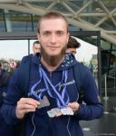 Avropa Çempionatında medallar qazanmış gimnastlar Azərbaycana qayıdıb (FOTO)