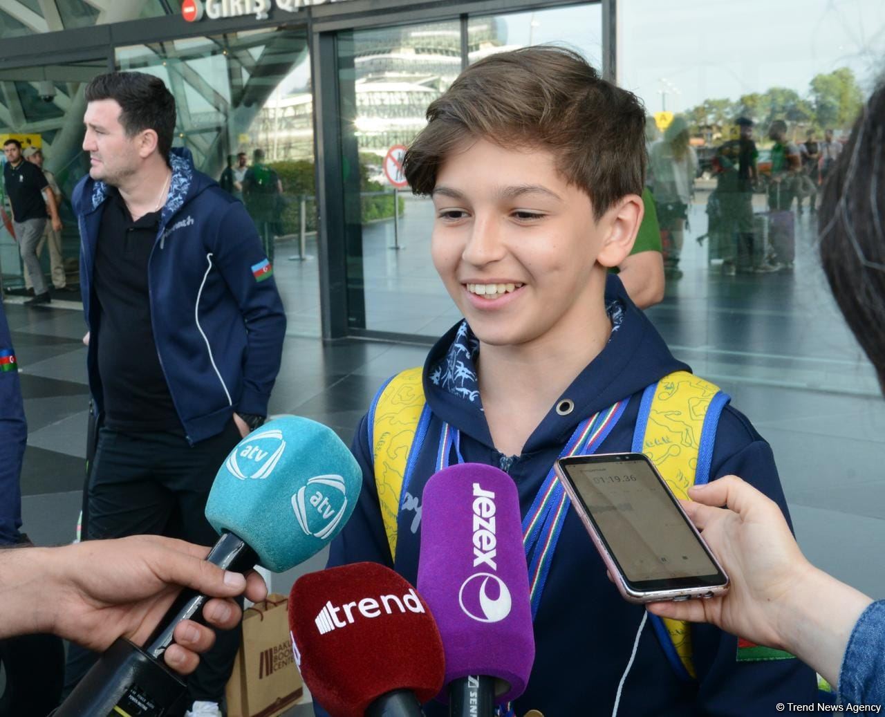 Avropa Çempionatında medallar qazanmış gimnastlar Azərbaycana qayıdıb (FOTO)