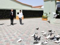 Prezident İlham Əliyev Ramanada qəsəbə sakini ilə söhbət edib (FOTO/VİDEO)