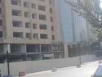 Bakının mərkəzində çoxmərtəbəli bina sökülür (FOTO)