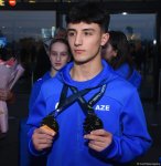 Avropa çempionatında qızıl və gümüş medallar qazanan gimnastlarımız Vətənə dönüblər (FOTO)