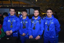 Avropa çempionatında qızıl və gümüş medallar qazanan gimnastlarımız Vətənə dönüblər (FOTO)