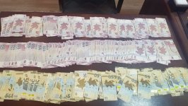 Nərimanovda quldurluq: 61 500 manat ələ keçirən şəxslər tutuldu (FOTO/VİDEO)