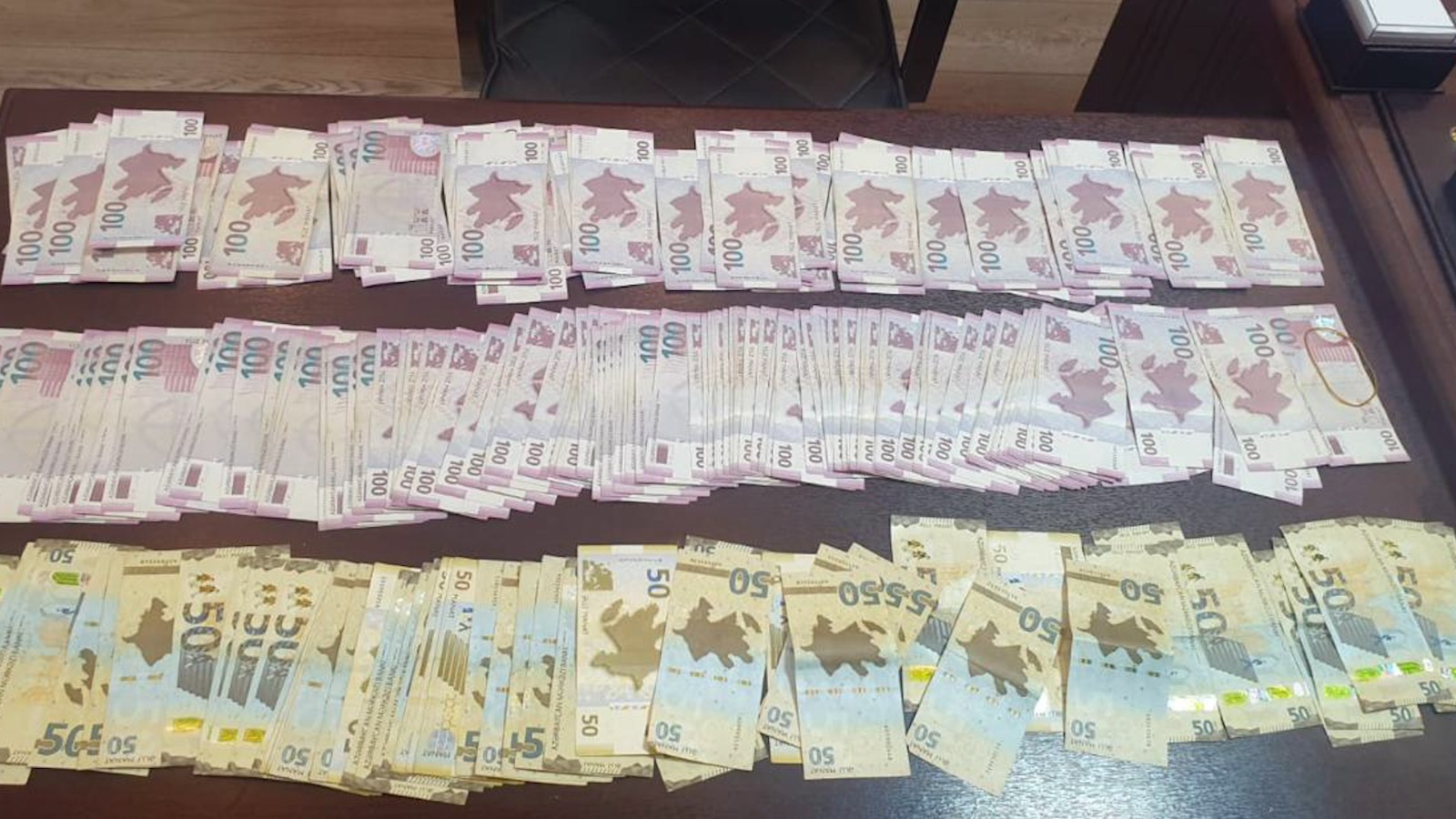 Nərimanovda quldurluq: 61 500 manat ələ keçirən şəxslər tutuldu (FOTO/VİDEO)