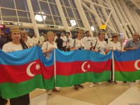 Olimpiya Oyunlarında uğurlu çıxış edən Azərbaycan millisi Vətənə qayıdıb (FOTO/VİDEO)