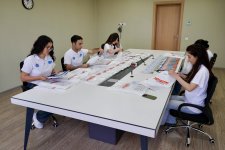 DİM şəhid övladlarına qiymətləndirmə kitabçalarını hədiyyə edib (FOTO)