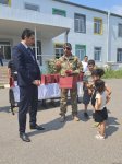 Həsənrizə çatan ailələrə evlərinin açarları təqdim edildi (YENİLƏNİB) (FOTO)