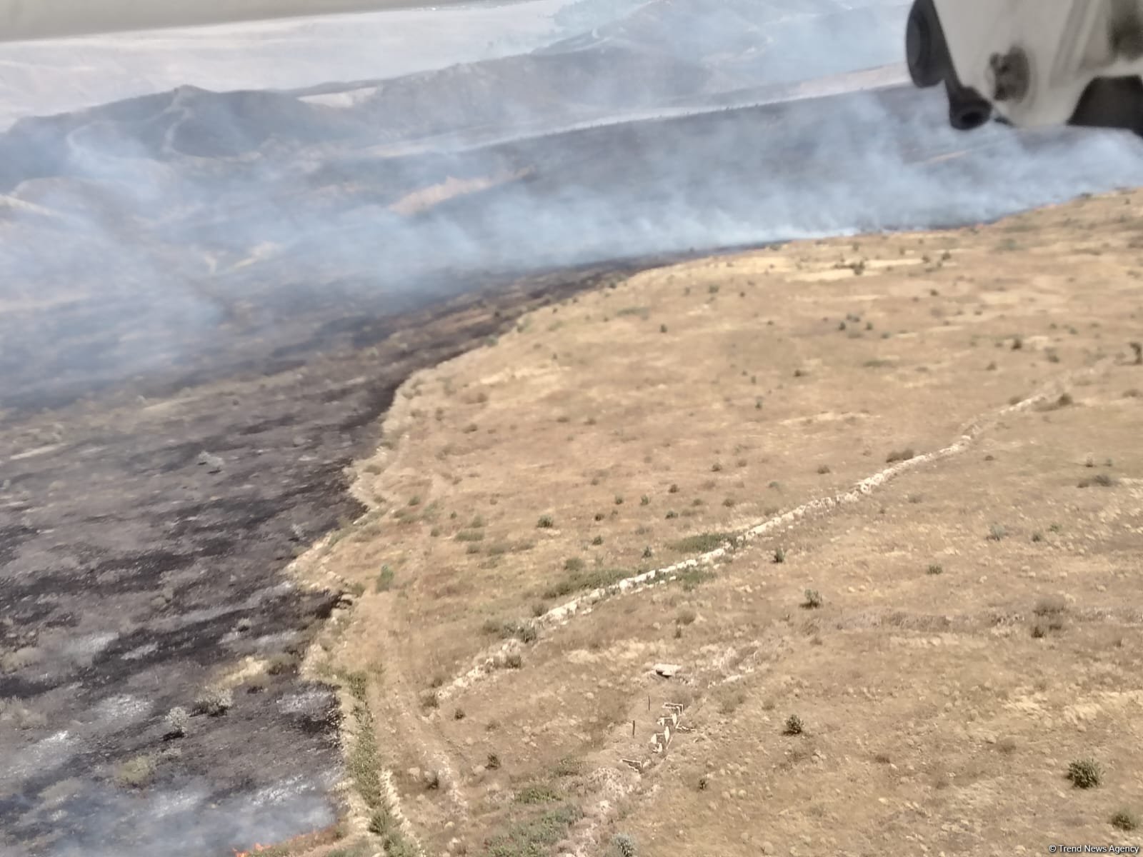 Ağdərədə açıq ərazidə yanğın: helikopter cəlb olunub (FOTO)