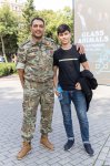 Şəhidlərin ailə üzvləri və qazilər fəxri qonaq qismində Formula 1 yarışlarını izləyiblər (FOTO)