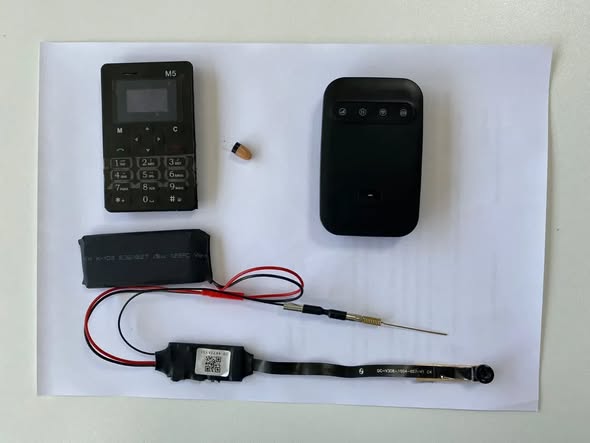 DİM imtahanlarda texniki vasitələrin qanunsuz istifadəsi ilə bağlı açılan cinayət işinin detallarını açıqlayıb (FOTO)