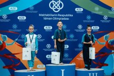 Məktəblilərin Respublika İdman Olimpiadası çərçivəsində bədii gimnastika yarışlarına start verilib (FOTO)