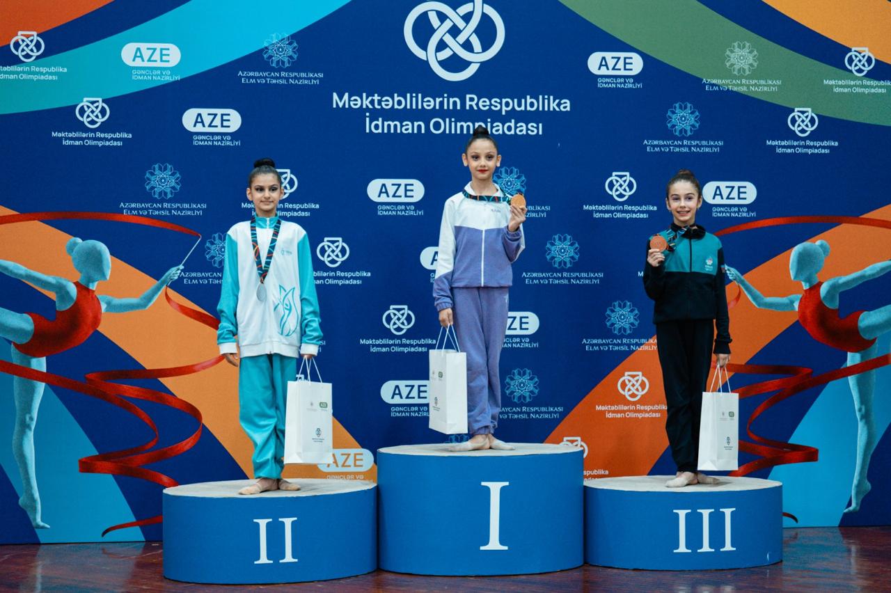 Məktəblilərin Respublika İdman Olimpiadası çərçivəsində bədii gimnastika yarışlarına start verilib (FOTO)